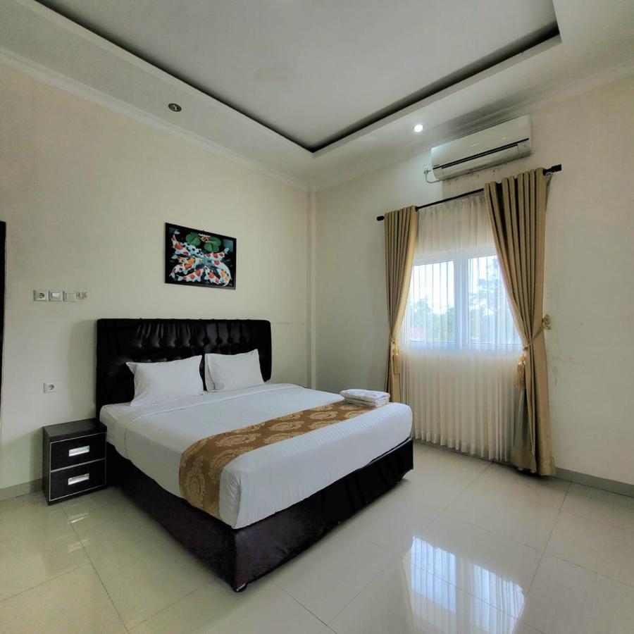 Mahakam Guest House Паданг Номер фото