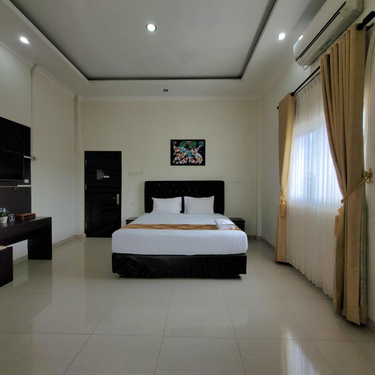 Mahakam Guest House Паданг Номер фото