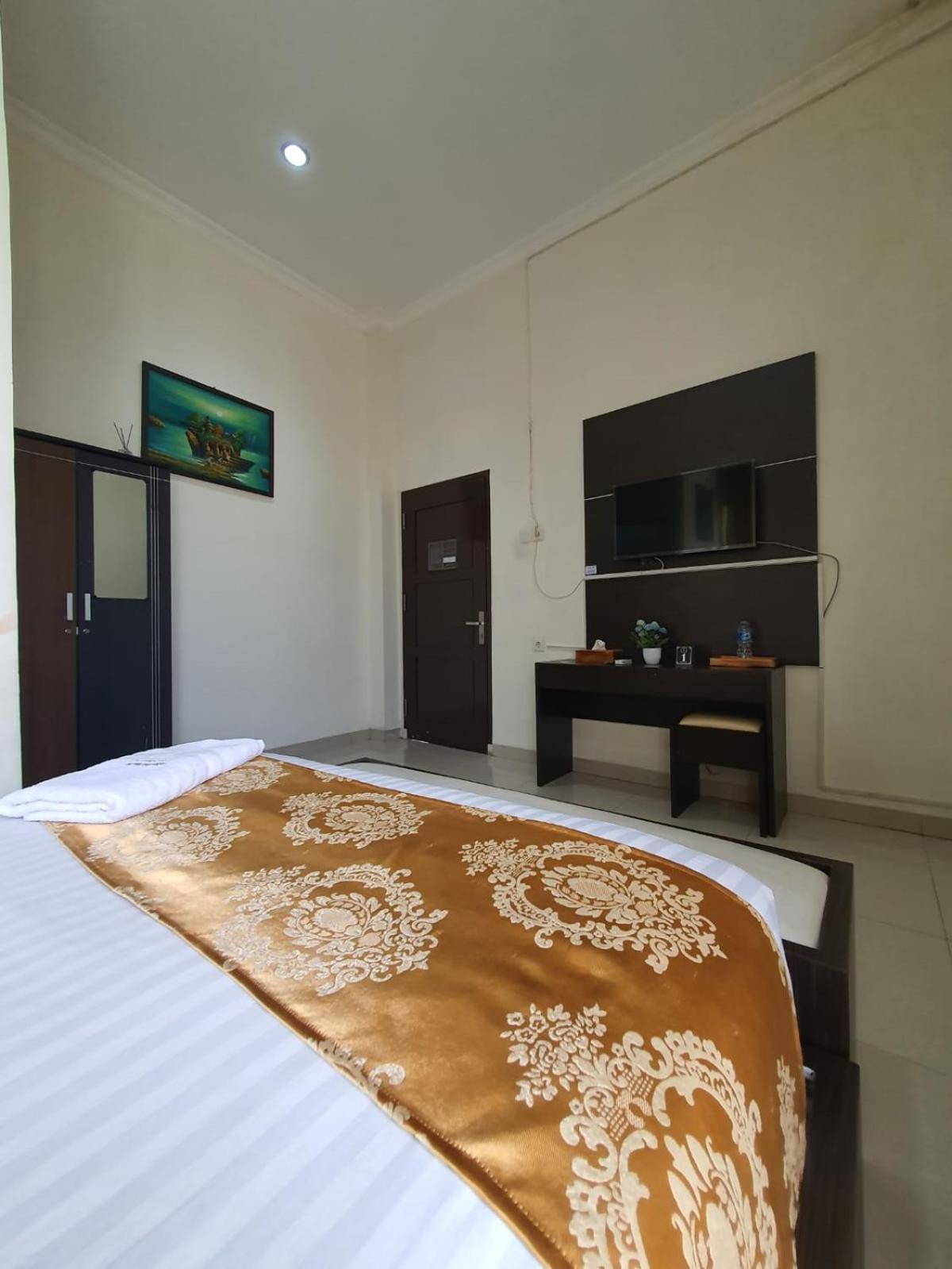 Mahakam Guest House Паданг Номер фото