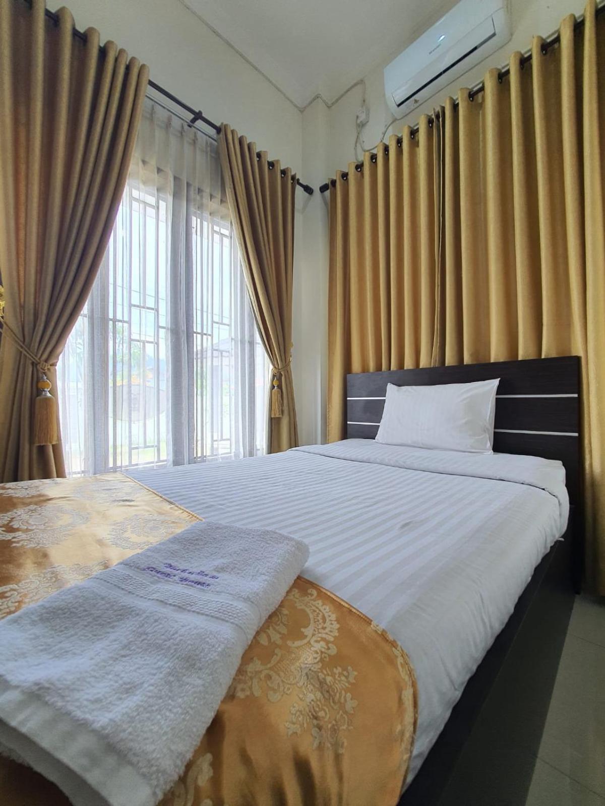 Mahakam Guest House Паданг Номер фото